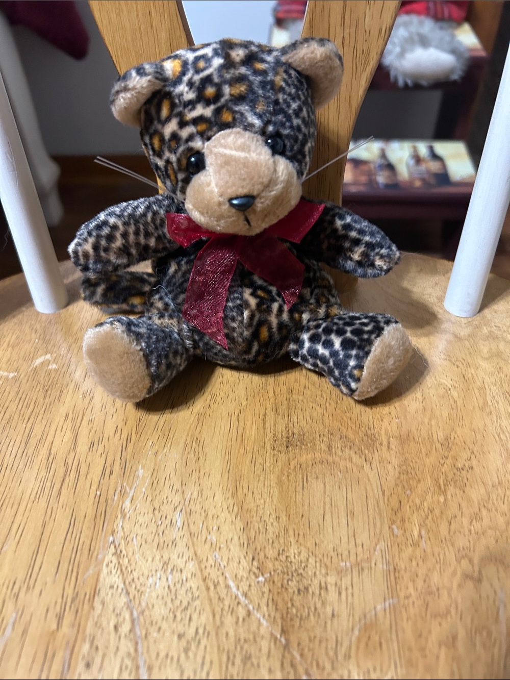 Plush Leopard Print Teddy Bear with Red Bow